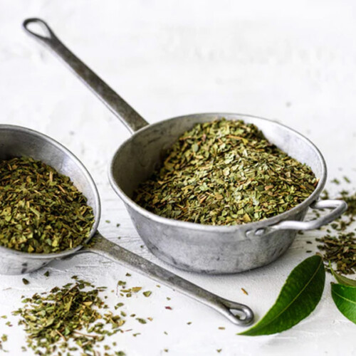 1-2 Taste Lemon Myrtle Dried Leaf Coarse Cut in rustic metal measuring cups with USDA Organic label